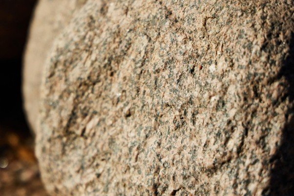 Light across a rough stone surface