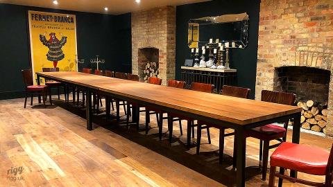 A long table set simply and unoccupied