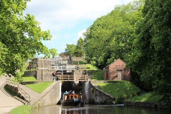 33 Receiving What Is Given Canal lock chamber with water rising as gates remain closed.