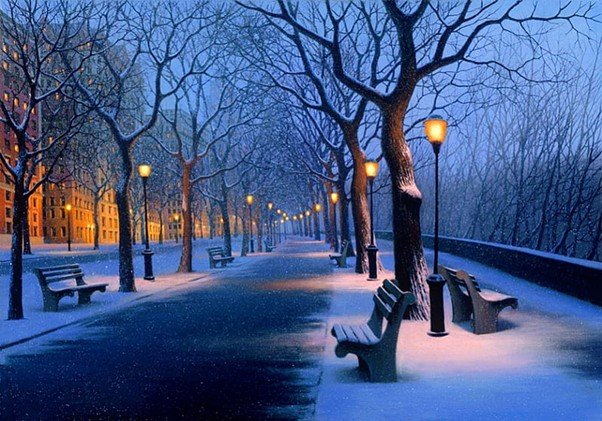 34 Light That Finds Us Snowflakes falling through evening air illuminated by a streetlight.