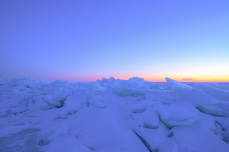Wide ice field stretching toward distant horizon.